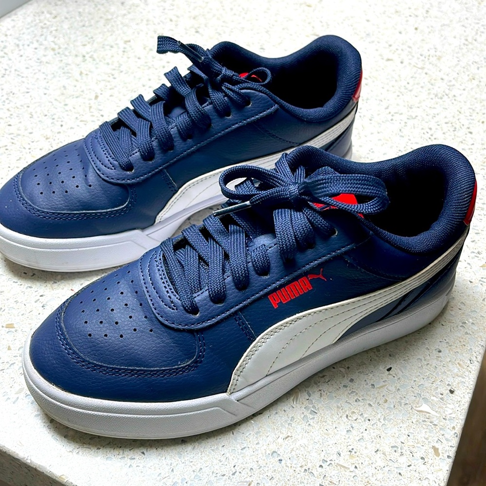 Red white and blue Puma.